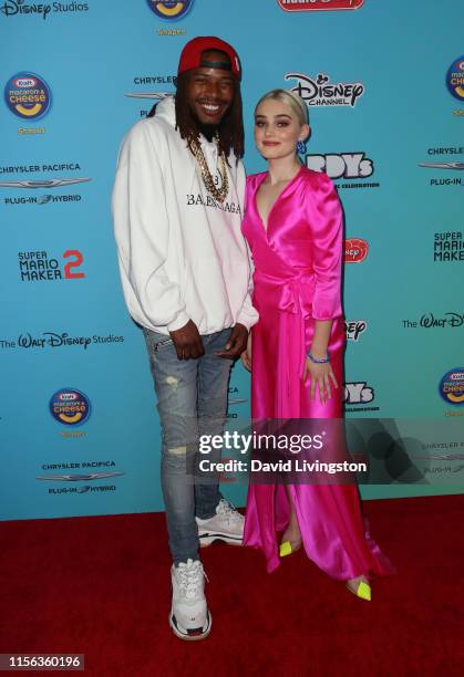 Fetty Wap and Meg Donnelly attend the 2019 Radio Disney Music Awards at CBS Studios - Radford on June 16, 2019 in Studio City, California.