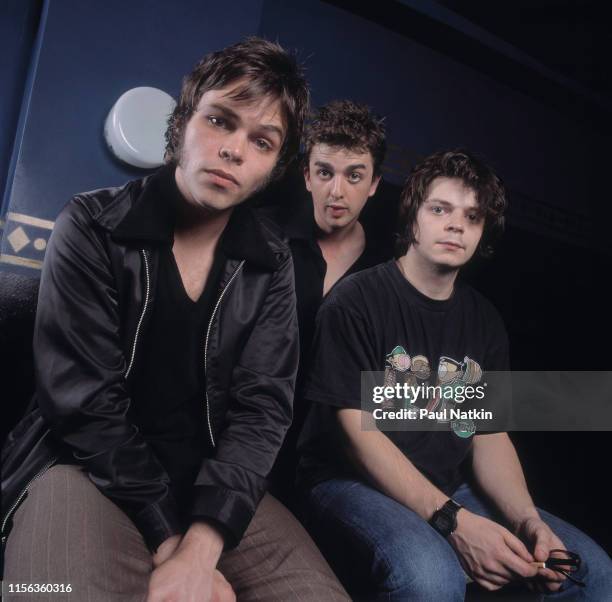 Portrait of English Alternative Rock group Supergrass as they pose backstage at the Metro, Chicago, Illinois, July 23, 1997. Pictured are, from left,...