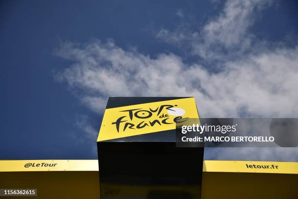 Picture taken on July 18, 2019 shows the top of the podium displaying the logo of the Tour de France during the twelfth stage of the 106th edition of...