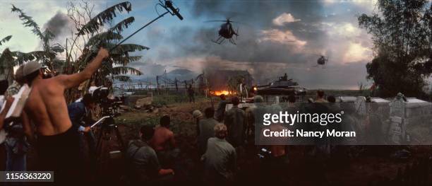 Rear panoramic view of Francis Ford Coppola with cast and crew on the film set of "Apocalypse Now" movie. Philippines 12/1/1976 -- CREDIT: Nancy Moran