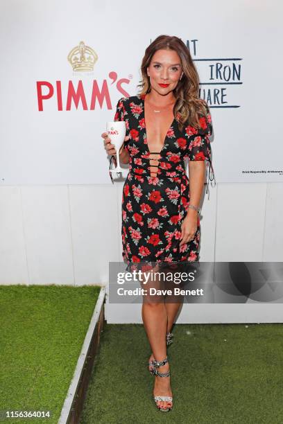 Candice Brown celebrates the Pimm's Summer Garden at Flat Iron Square on July 18, 2019 in London, England.