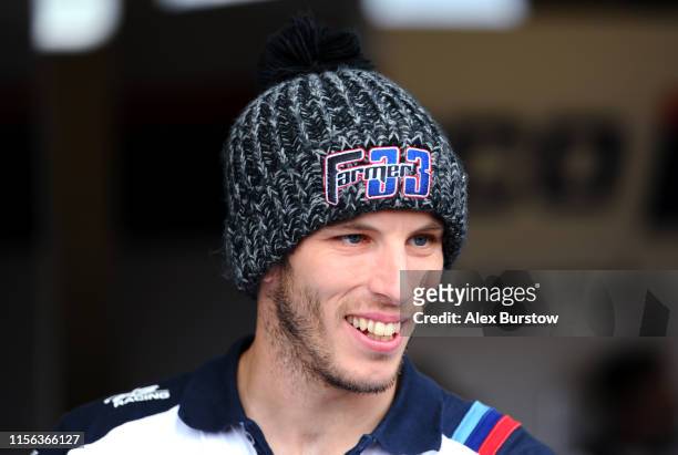 Keith Farmer of Great Britain looks on during a pit walk session between races during the British Superbike Championship at Brands Hatch on June 16,...
