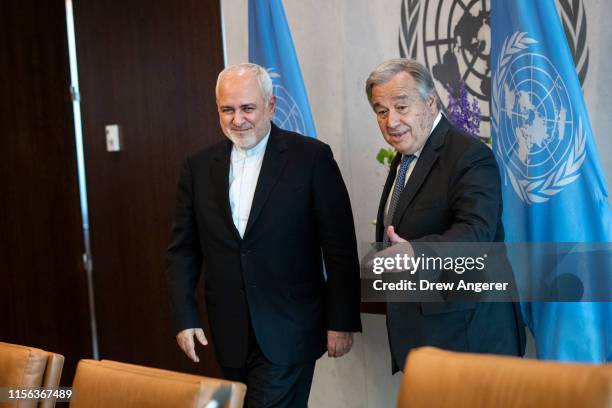 Mohammad Javad Zarif, the foreign minister of Iran, and UN Secretary-General Antonio Guterres arrive for a meeting at United Nations headquarters,...