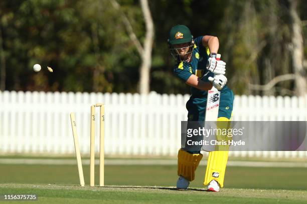 Meg Lanning is bowled during the 50 over practice match between Australian Women's National team and Australia A at Wynnum Manly Cricket Club on June...
