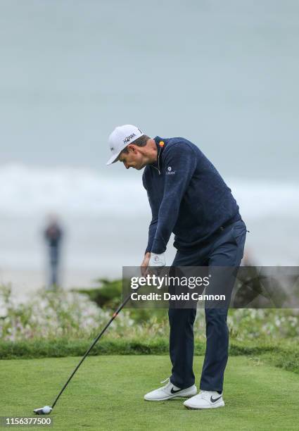 Justin Rose of England plays his tee shot on the par 4, 11th hole during the final round of the 2019 U.S.Open Championship at the Pebble Beach Golf...