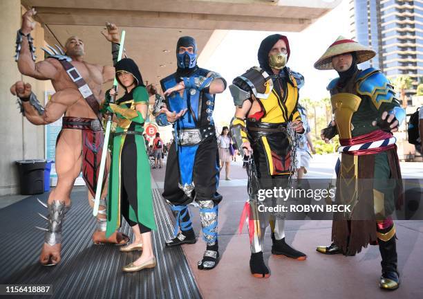 Cosplayers portraying characters from "Mortal Kombat" attend the 2019 Comic-Con International on July 18, 2019 in San Diego, California.