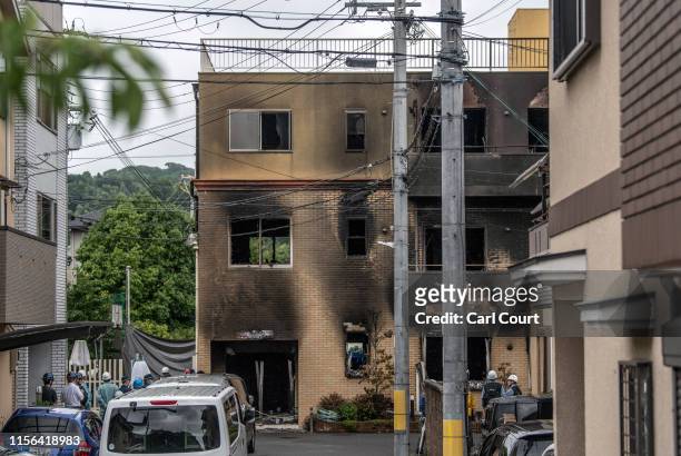 The Kyoto Animation Co studio building is pictured after being set ablaze by an arsonist on July 19, 2019 in Kyoto, Japan. Thirty three people are...