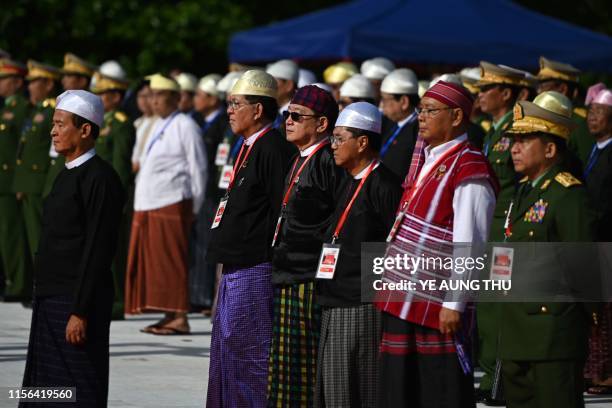 Myanmar's President Win Myint and Army Chief Min Aung Hlaing attend the Martyrs' Day ceremony in Yangon on July 19, 2019. - Myanmar observes the 72nd...