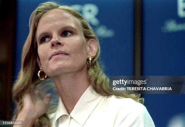 Costa Rican swimmer Claudia Poll at a press conference 07 July, 2000 in San Jose announces her participation in the coming swimming competition Janet...