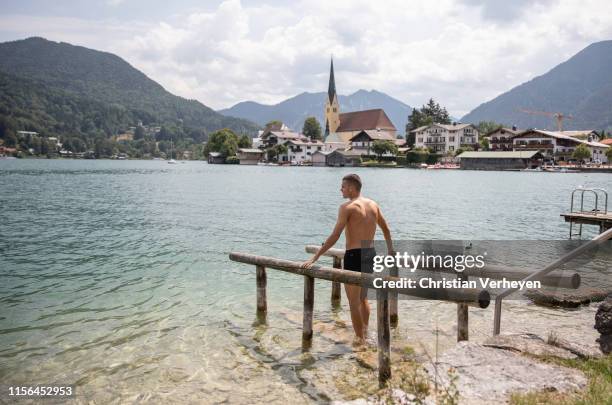 Laszlo Benes cools down at the Lake Tegernsee after a training session at the Borussia Moenchengladbach Training Camp on July 19, 2019 in...