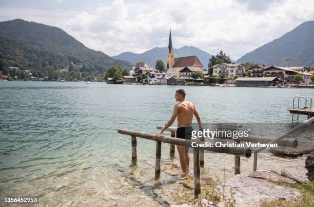 Laszlo Benes cools down at the Lake Tegernsee after a training session at the Borussia Moenchengladbach Training Camp on July 19, 2019 in...