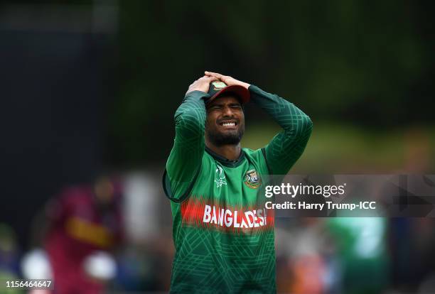 Mahmudullah of West Indies reacts to a missed chance during the Group Stage match of the ICC Cricket World Cup 2019 between West Indies and...