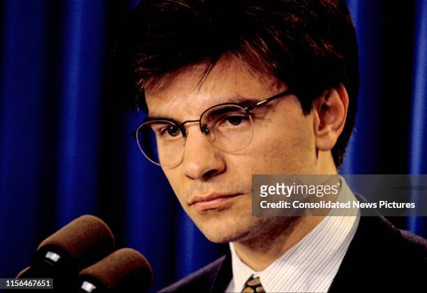 View of White House Director of Communications George Stephanopoulos behind a bank of microphones in the White House Briefing Room, Washington DC,...