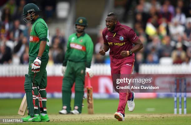 Andre Russell of West Indies celebrates taking the wicket of Soumya Sarkar of Bangladesh during the Group Stage match of the ICC Cricket World Cup...