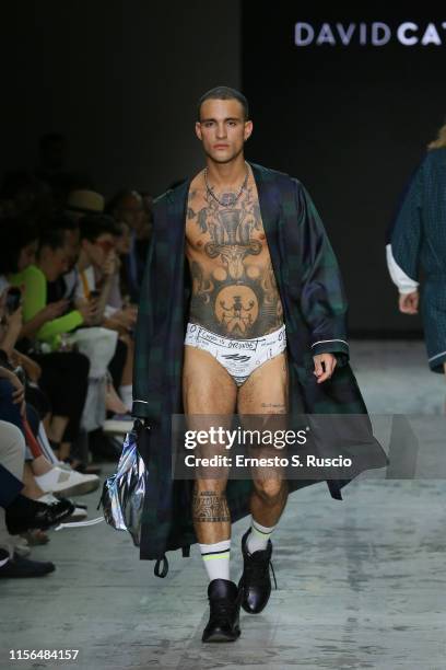 Model walks the runway at the David Catalan fashion show during the Milan Men's Fashion Week Spring/Summer 2020 on June 17, 2019 in Milan, Italy.