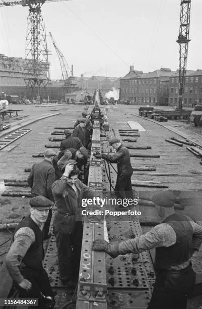 Ship Riveting Process Riveting Metal Photos and Premium High Res Pictures - Getty Images