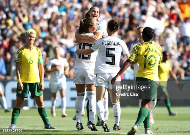 Melanie Leupolz of Germany celebrates with teammates after scoring her team's first goal during the 2019 FIFA Women's World Cup France group B match...