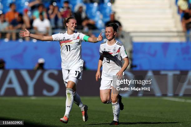 Alexandra Popp of Germany celebrates after scoring her team's third goal during the 2019 FIFA Women's World Cup France group B match between South...