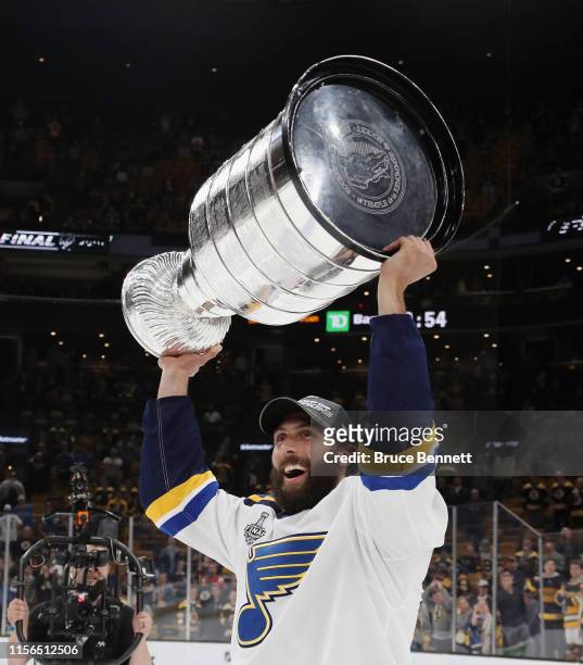 Robert Bortuzzo of the St. Louis Blues holds the Stanley Cup following the Blues victory over the Boston Bruins at TD Garden on June 12, 2019 in...