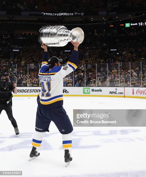 Robert Bortuzzo of the St. Louis Blues holds the Stanley Cup following the Blues victory over the Boston Bruins at TD Garden on June 12, 2019 in...