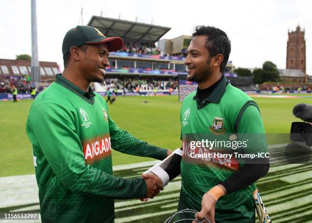 Shakib Al Hasan of Bangladesh shakes hands with Rubel Hossain of Bangladesh after scoring an unbeaten 124 during the Group Stage match of the ICC...