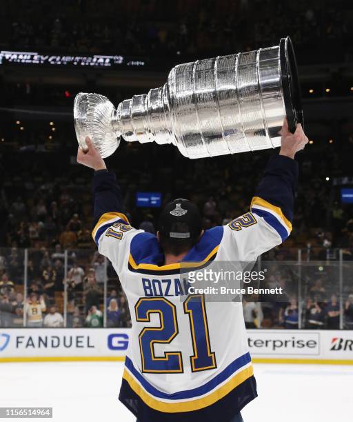 Tyler Bozak of the St. Louis Blues holds the Stanley Cup following the Blues victory over the Boston Bruins at TD Garden on June 12, 2019 in Boston,...