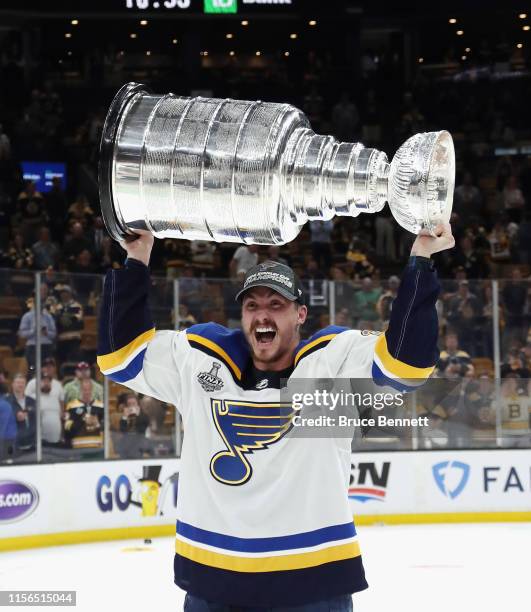 Tyler Bozak of the St. Louis Blues holds the Stanley Cup following the Blues victory over the Boston Bruins at TD Garden on June 12, 2019 in Boston,...