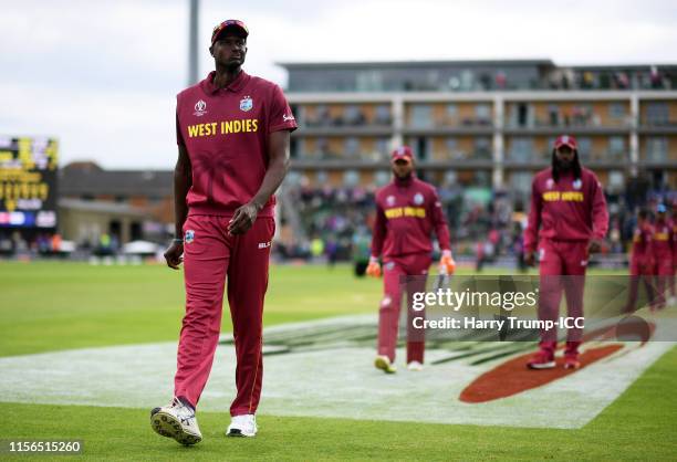 Jason Holder of West Indies cuts a dejected figure after defeat to Bangladesh during the Group Stage match of the ICC Cricket World Cup 2019 between...