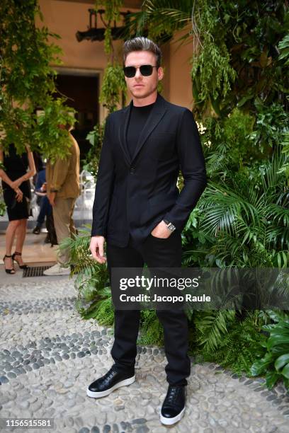 Richard Madden attends the Giorgio Armani fashion show during the Milan Men's Fashion Week Spring/Summer 2020 on June 17, 2019 in Milan, Italy.