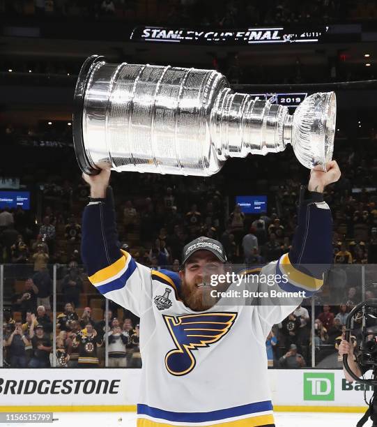 Ryan O'Reilly of the St. Louis Blues holds the Stanley Cup following the Blues victory over the Boston Bruins at TD Garden on June 12, 2019 in...