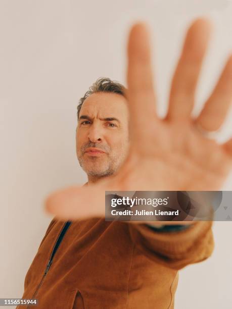 Actor Jean Dujardin poses for a portrait on May 15, 2019 in Cannes, France.