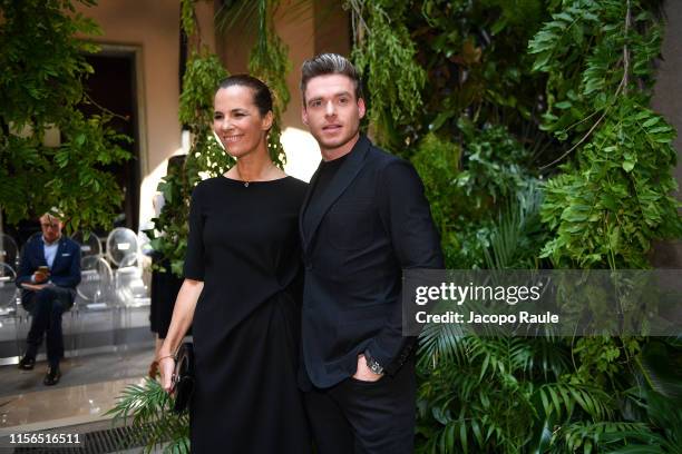 Roberta Armani and Richard Madden attend the Giorgio Armani fashion show during the Milan Men's Fashion Week Spring/Summer 2020 on June 17, 2019 in...