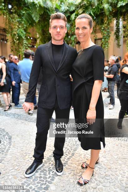 Roberta Armani and Richard Madden attend the Giorgio Armani fashion show during the Milan Men's Fashion Week Spring/Summer 2020 on June 17, 2019 in...