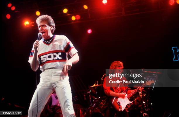 American Rock musicians Dennis DeYoung and Tommy Shaw, both of the group Styx, perform onstage during the group's 'Kilroy Was Here Tour' at the...