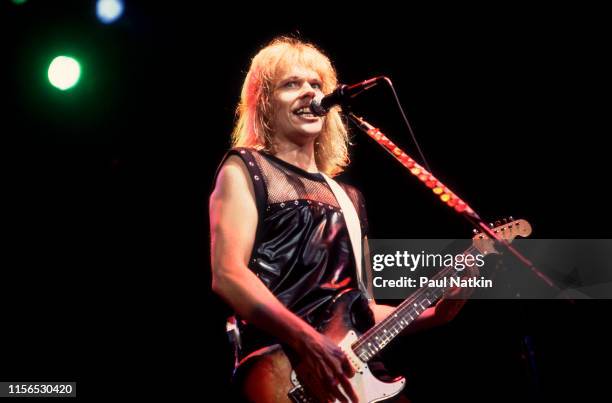 American Rock musician James 'JY' Young, of the group Styx, plays guitar as he performs during the group's 'Kilroy Was Here Tour' at the Auditorium...