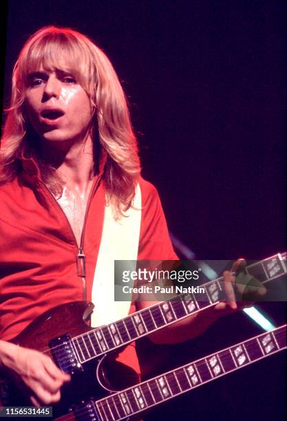 American Rock musician Tommy Shaw, of the group Styx, plays guitar as he performs onstage at the Auditorium Theater, Chicago, Illinois, September 23,...