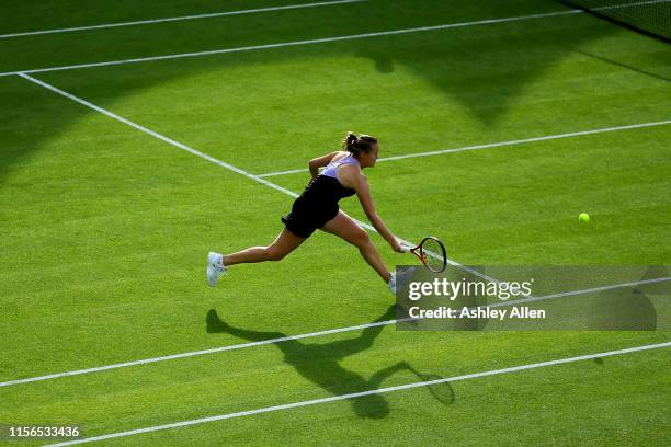 Evgeniya Rodina of Russia in action during her singles match against Kristina Mladenovic of France day one of the Nature Valley Classic at Edgbaston...