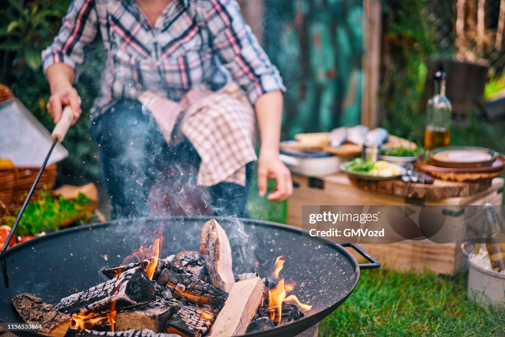 Preparing Fish for Cooking Over Open Campfire