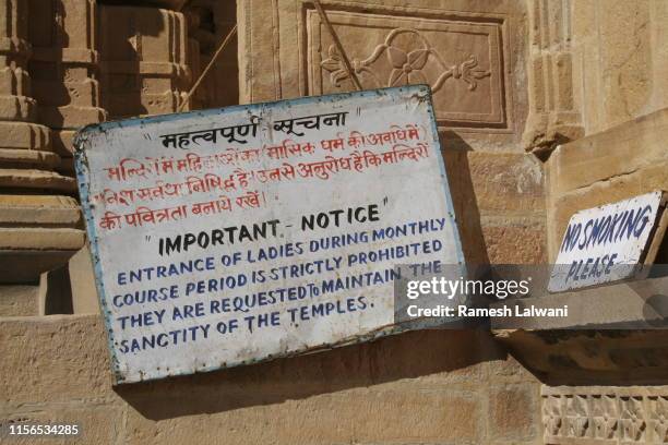 notice outside jain temple - jainism stock pictures, royalty-free photos & images