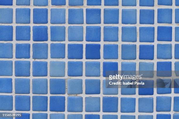 tiled wall - blue bathroom stock-fotos und bilder