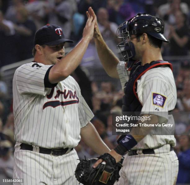 Bbisping@startribune.com Minneapolis, Saturday, 6/18/11] Twins vs San Diego. Twins Matt Capps and Joe Mauer celebrated at the end of the game after...