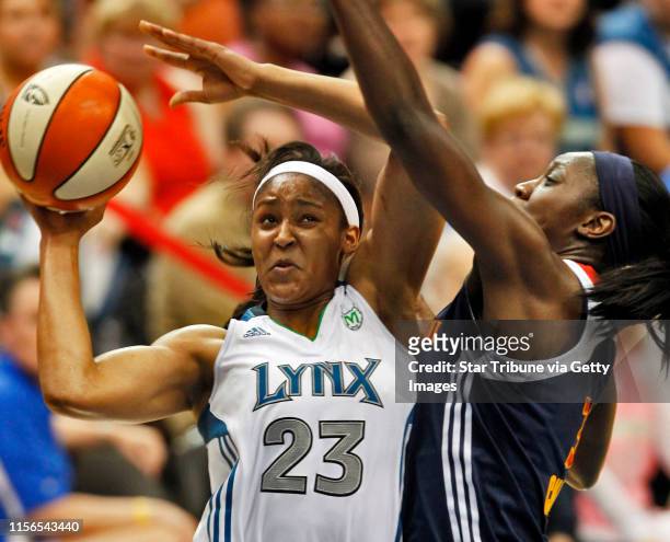 Minnesota Lynx vs. Connecticut Sun basketball Saturday, July 9,2011. Lynx Maya Moore went up for two points against the defense of Sun's Tina...