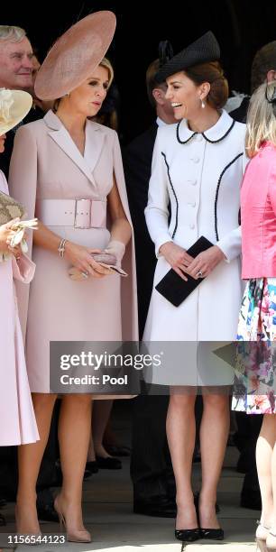 Queen Maxima of the Netherlands and Catherine, Duchess of Cambridge attend the Order of the Garter service at St George's Chapel on June 17, 2019 in...