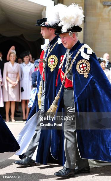 Queen Maxima of the Netherlands and Catherine, Duchess of Cambridge look on as Prince William, Duke of Cambridge and Prince Charles, Prince of Wales...