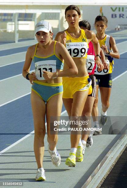 Adriana Quino Salazar from Bolivia, leads the 10,000 mts race before being disqualified for a technical foul, during the VII ODESUR Games that took...