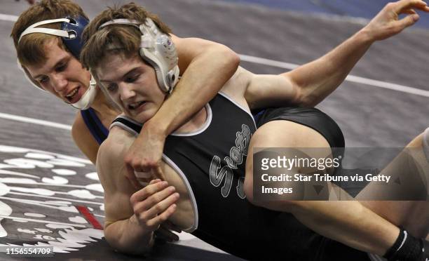Prep state individual wrestling quarterfinal championships -Gabe Fogarty of Scott West, right, wrestled Tyler Bemboom of Foley in the Class 2A 145-lb...