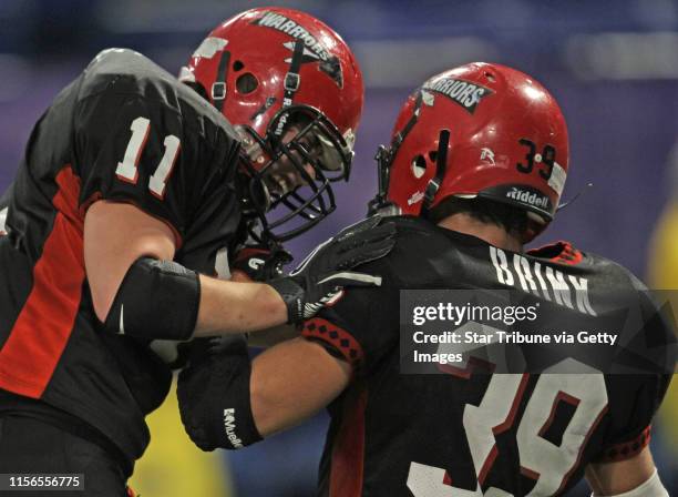 Kittson County Central vs. Wheaton-Herman-Norcross in 9-Man semi-final game at the Dome, 11/19/11. Wheaton-Herman-Norcross Brock Sweere and Wolfgang...