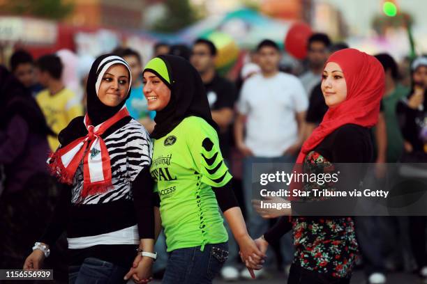 Group of young women danced along Warren Avenue June 17, at the 17 annual Arab American Festival in Dearborn, MI. Dearborn.] JERRY HOLT/ STAR TRIBUNE...