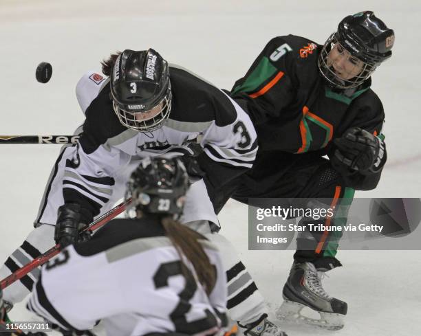 Girls State Hockey Tournament, Class AA quarterfinals, Roseville vs. Grand Rapids/Greenway, 2/23/12. Roseville's Kate Flug crashed the net as she was...