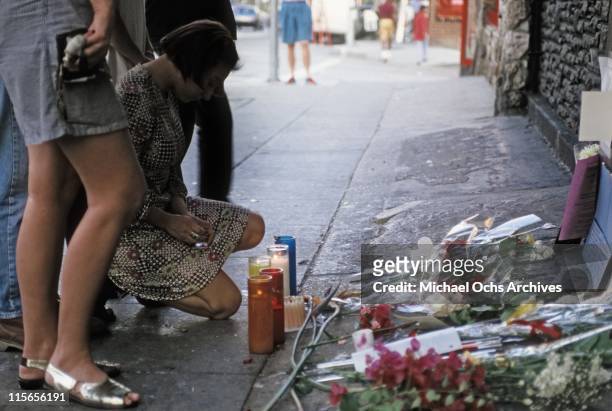 The exterior of The Viper Room the day after the death of actor River Phoenix. Fans are placing flowers, candles and notes at the spot where he...